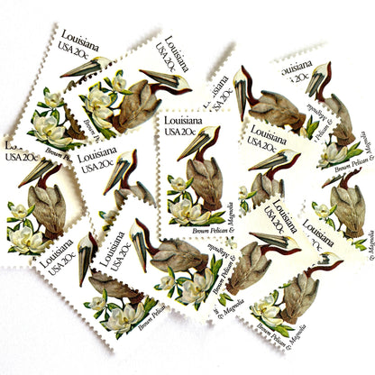 Image of Louisiana State Bird and Flower postage stamps from 1982, featuring a Brown Pelican and Magnolia on vintage unused 20-cent USPS postage, Scott 1970.