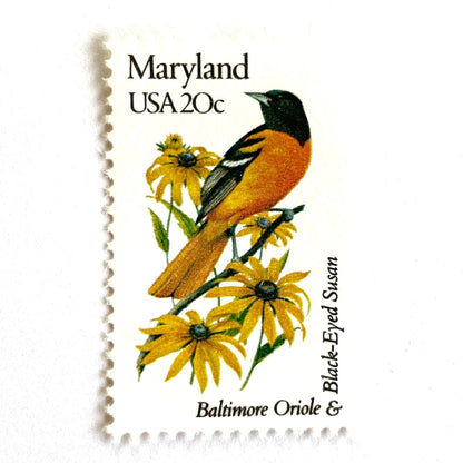 Image of Maryland State Bird and Flower postage stamps from 1982, featuring a Baltimore Oriole and Black-Eyed Susan on vintage unused 20-cent USPS postage, Scott 1972.