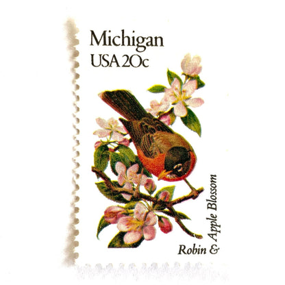 Image of Michigan State Bird and Flower postage stamps from 1982, featuring a Robin and Apple Blossom on vintage unused 20-cent USPS postage, Scott 1974.