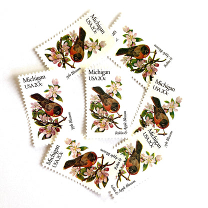 Image of Michigan State Bird and Flower postage stamps from 1982, featuring a Robin and Apple Blossom on vintage unused 20-cent USPS postage, Scott 1974.