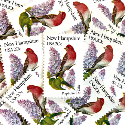 Image of New Hampshire State Bird and Flower postage stamps from 1982, featuring a Purple Finch and Lilac on vintage unused 20-cent USPS postage, Scott 1981.