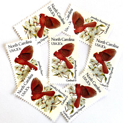 Image of North Carolina State Bird and Flower postage stamps from 1982, featuring a Cardinal and Flowering Dogwood on vintage unused 20-cent USPS postage, Scott 1985.
