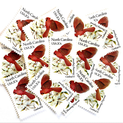 Image of North Carolina State Bird and Flower postage stamps from 1982, featuring a Cardinal and Flowering Dogwood on vintage unused 20-cent USPS postage, Scott 1985.