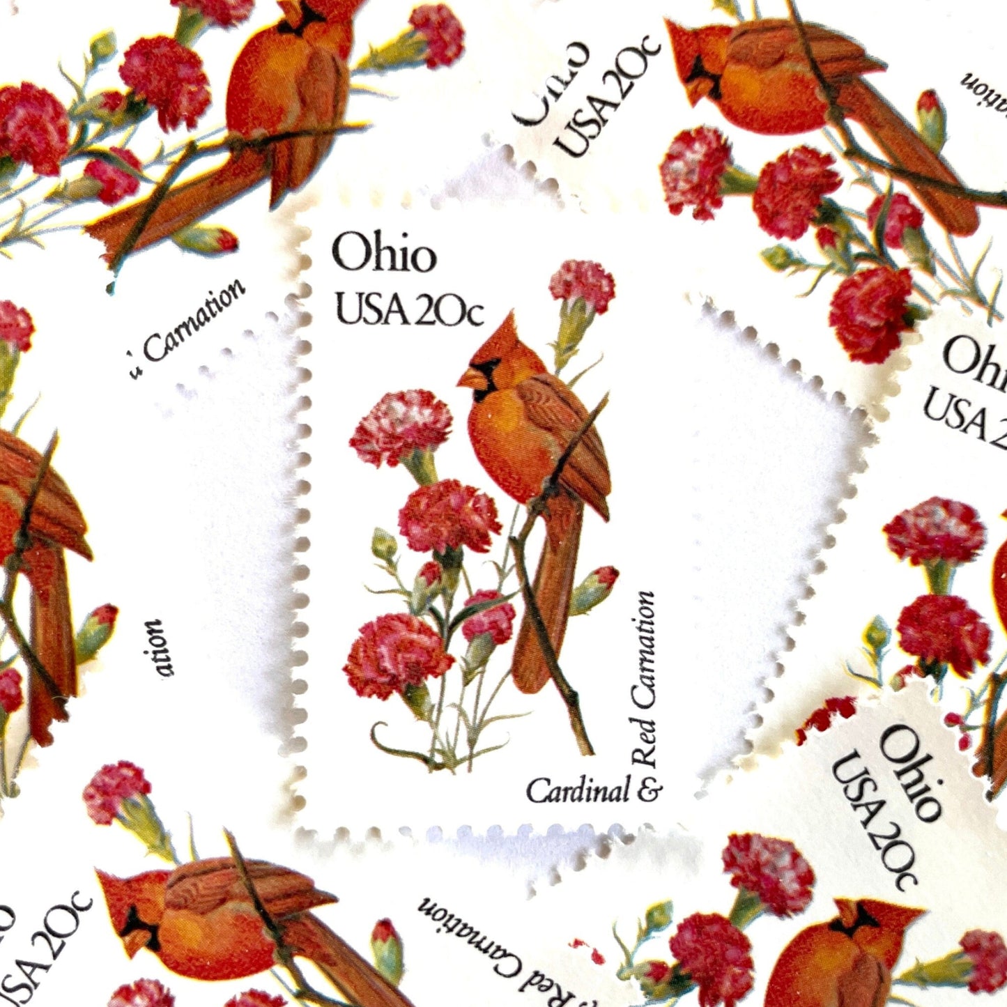 Image of Ohio State Bird and Flower postage stamps from 1982, featuring a Cardinal and Scarlet Carnation on vintage unused 20-cent USPS postage, Scott 1987.