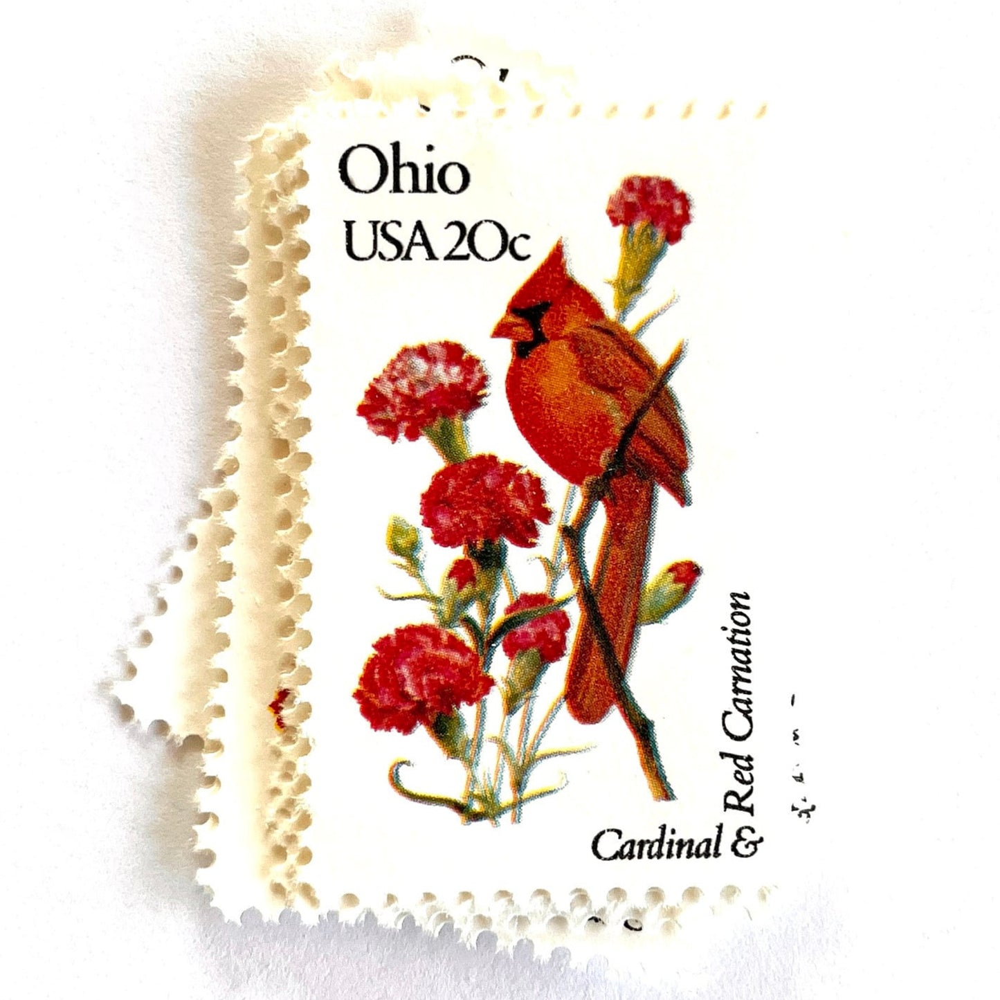 Image of Ohio State Bird and Flower postage stamps from 1982, featuring a Cardinal and Scarlet Carnation on vintage unused 20-cent USPS postage, Scott 1987.