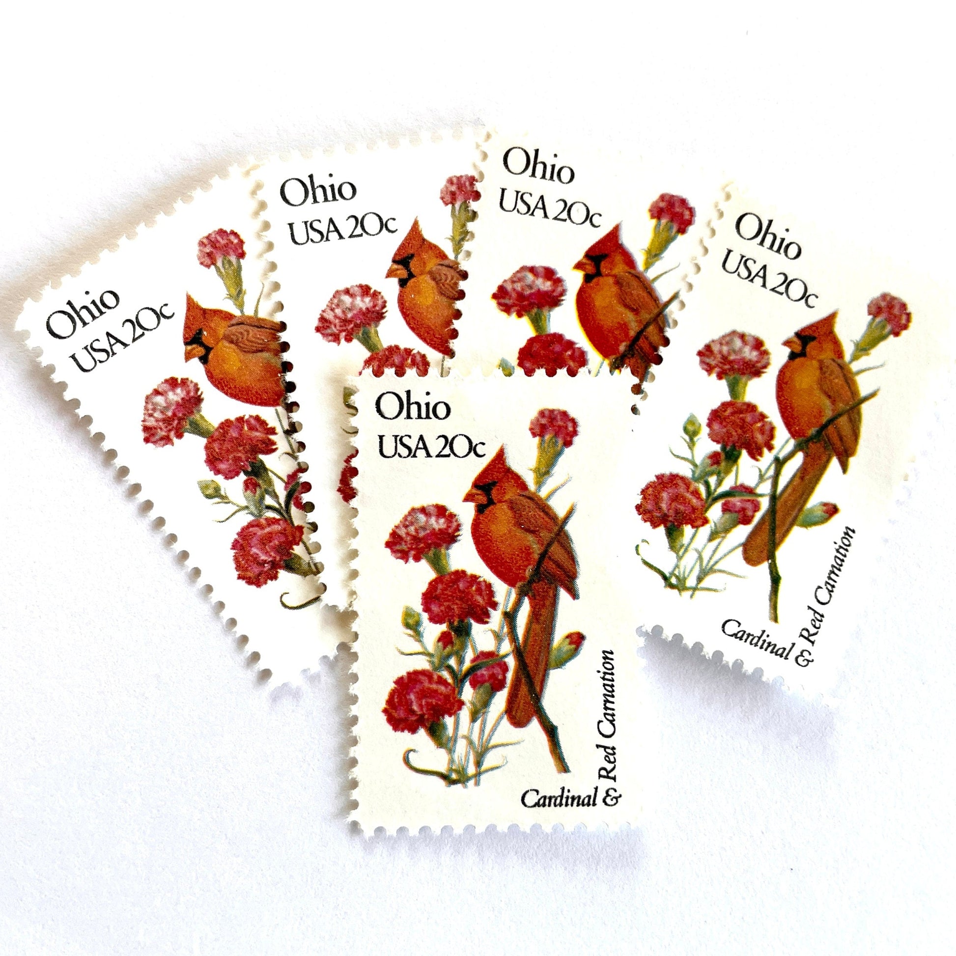 Image of Ohio State Bird and Flower postage stamps from 1982, featuring a Cardinal and Scarlet Carnation on vintage unused 20-cent USPS postage, Scott 1987.
