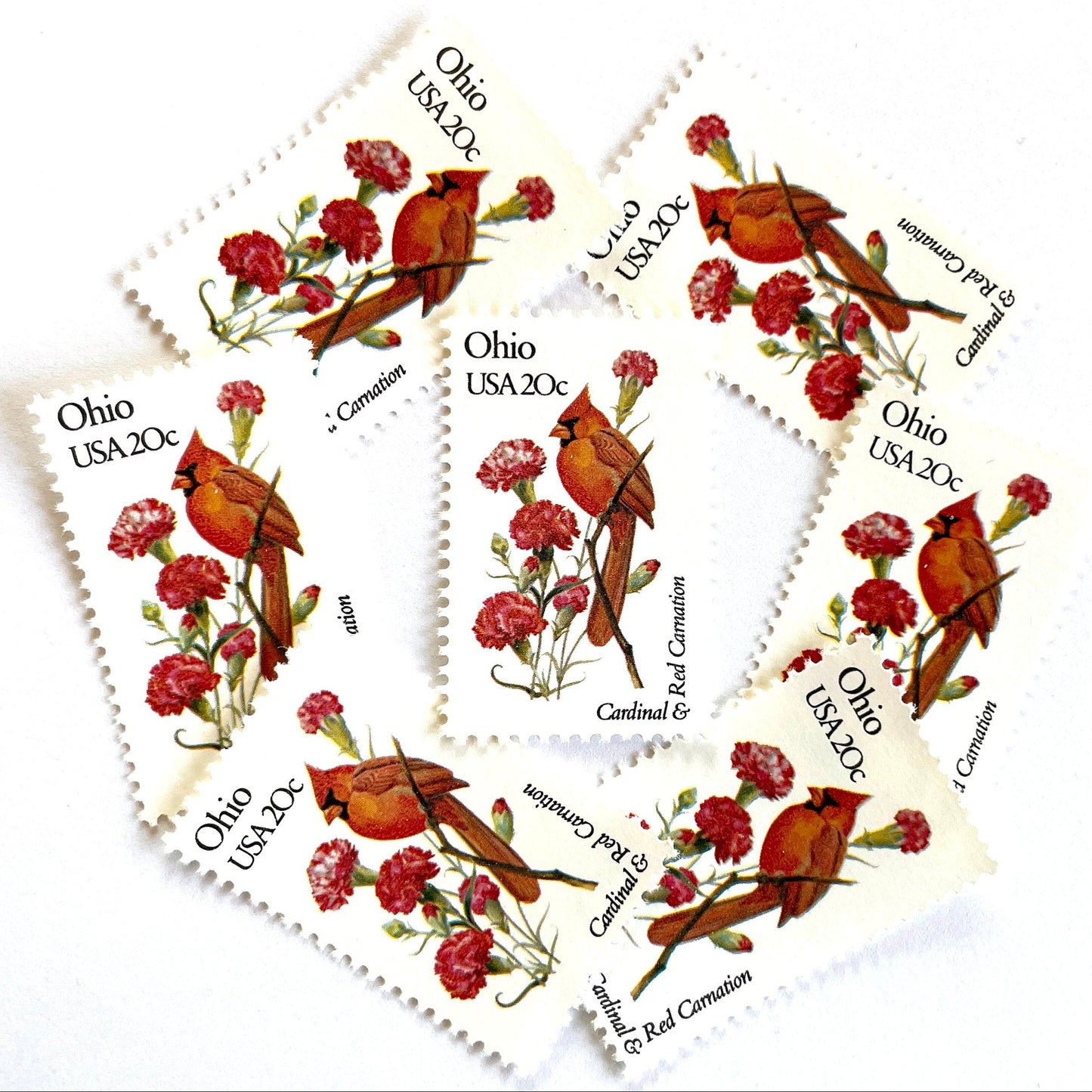 Image of Ohio State Bird and Flower postage stamps from 1982, featuring a Cardinal and Scarlet Carnation on vintage unused 20-cent USPS postage, Scott 1987.