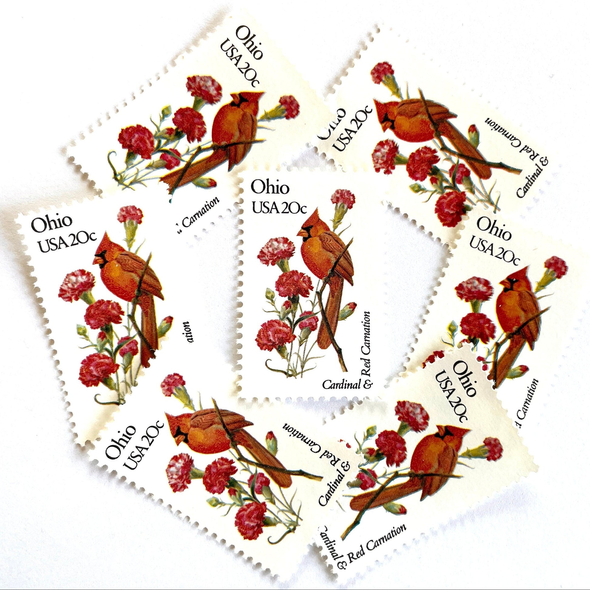 Image of Ohio State Bird and Flower postage stamps from 1982, featuring a Cardinal and Scarlet Carnation on vintage unused 20-cent USPS postage, Scott 1987.