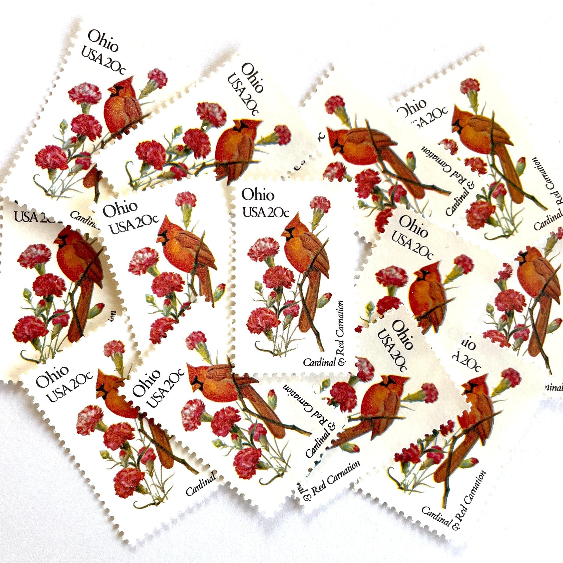 Image of Ohio State Bird and Flower postage stamps from 1982, featuring a Cardinal and Scarlet Carnation on vintage unused 20-cent USPS postage, Scott 1987.
