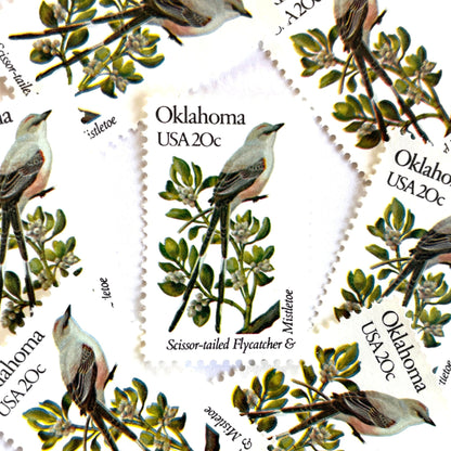 Image of Oklahoma State Bird and Flower postage stamps from 1982, featuring a Scissor-Tailed Flycatcher and Mistletoe on vintage unused 20-cent USPS postage, Scott 1988.
