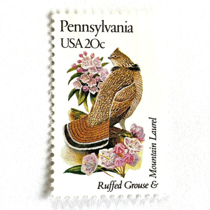 Image of Pennsylvania State Bird and Flower postage stamps from 1982, featuring a Ruffed Grouse and Mountain Laurel on vintage unused 20-cent USPS postage, Scott 1990.
