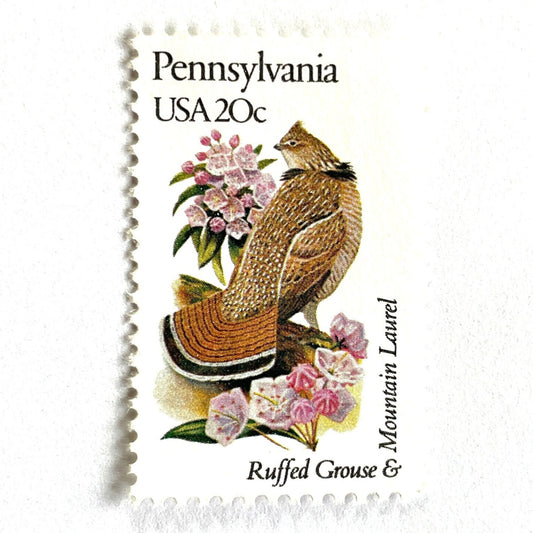 Image of Pennsylvania State Bird and Flower postage stamps from 1982, featuring a Ruffed Grouse and Mountain Laurel on vintage unused 20-cent USPS postage, Scott 1990.