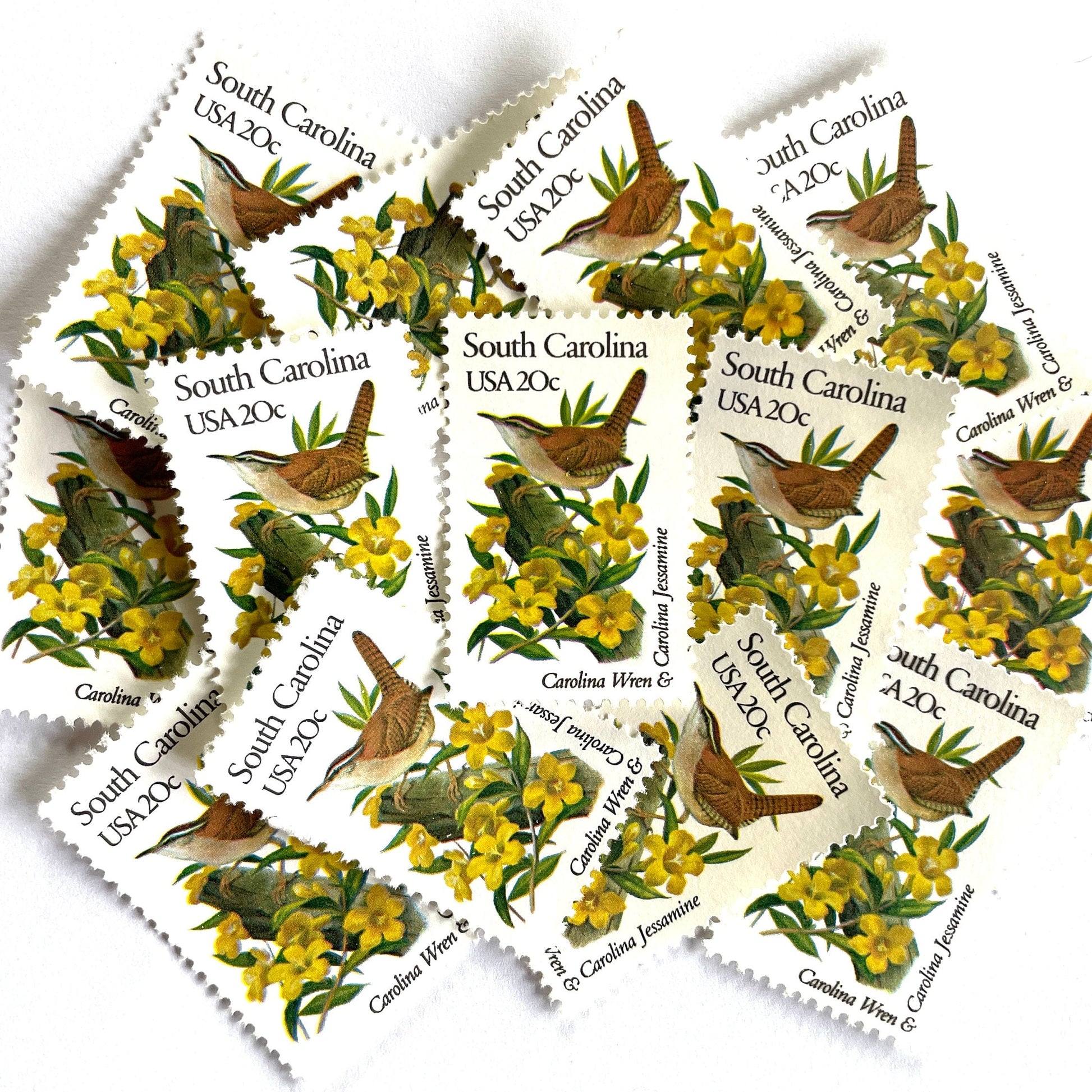 South Carolina State Bird and Flower postage stamps from 1982 featuring a Carolina Wren and Carolina Jessamine on vintage unused 20-cent USPS postage, Scott 1992.