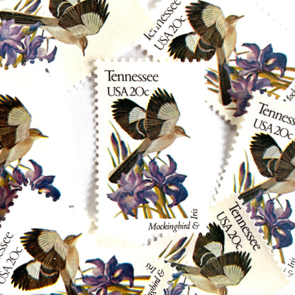 Tennessee State Bird and Flower postage stamps from 1982 featuring a Mockingbird and Iris on vintage unused 20-cent USPS postage, Scott 1994.
