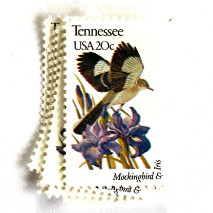 Tennessee State Bird and Flower postage stamps from 1982 featuring a Mockingbird and Iris on vintage unused 20-cent USPS postage, Scott 1994.