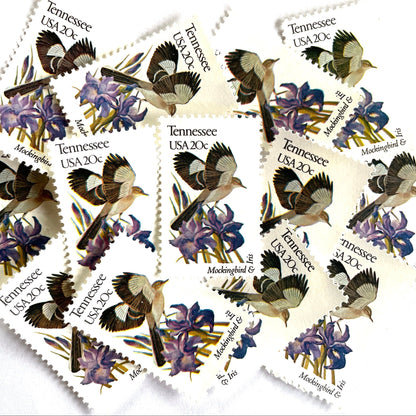Tennessee State Bird and Flower postage stamps from 1982 featuring a Mockingbird and Iris on vintage unused 20-cent USPS postage, Scott 1994.