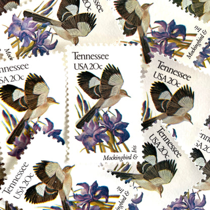 Tennessee State Bird and Flower postage stamps from 1982 featuring a Mockingbird and Iris on vintage unused 20-cent USPS postage, Scott 1994.