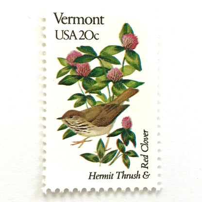 Vermont State Bird and Flower postage stamp from 1982 featuring a Hermit Thrush and Red Clover on vintage unused 20-cent USPS postage, Scott 1997.