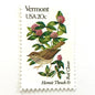 Vermont State Bird and Flower postage stamp from 1982 featuring a Hermit Thrush and Red Clover on vintage unused 20-cent USPS postage, Scott 1997.