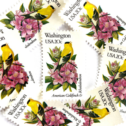Washington State Bird and Flower postage stamps from 1982 featuring a Willow Goldfinch and Coast Rhododendron on vintage unused 20-cent USPS postage, Scott 1999.