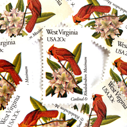 West Virginia State Bird and Flower postage stamps from 1982 featuring a Cardinal and Rhododendron on vintage unused 20-cent USPS postage, Scott 2000.