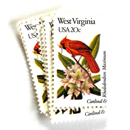 West Virginia State Bird and Flower postage stamps from 1982 featuring a Cardinal and Rhododendron on vintage unused 20-cent USPS postage, Scott 2000.