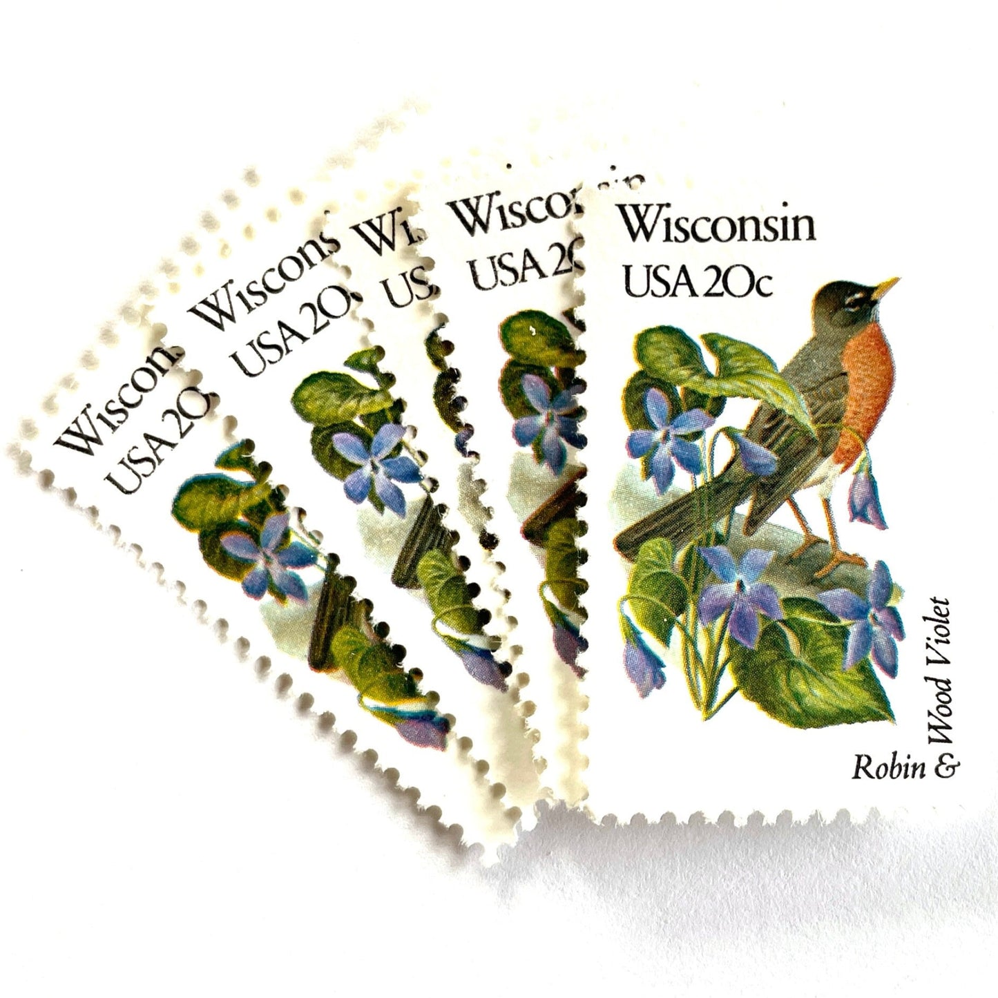 Wisconsin State Bird and Flower postage stamps from 1982 featuring a Robin and Wood Violet on vintage unused 20-cent USPS postage, Scott 2001.