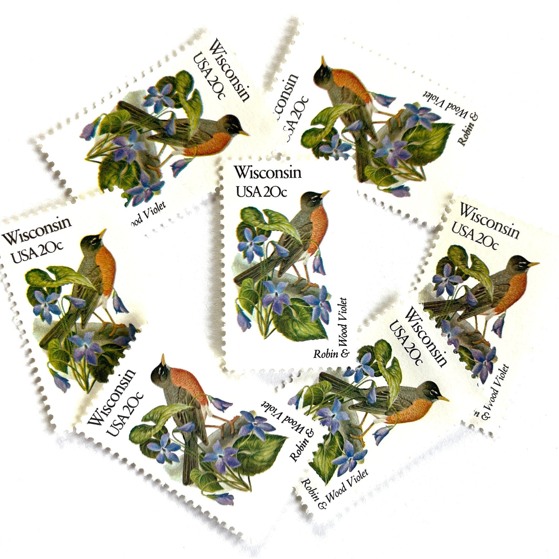 Wisconsin State Bird and Flower postage stamps from 1982 featuring a Robin and Wood Violet on vintage unused 20-cent USPS postage, Scott 2001.
