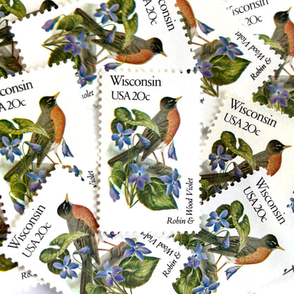 Wisconsin State Bird and Flower postage stamps from 1982 featuring a Robin and Wood Violet on vintage unused 20-cent USPS postage, Scott 2001.