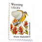 Wyoming State Bird and Flower postage stamp from 1982 featuring a Western Meadowlark and Indian Paintbrush on vintage unused 20-cent USPS postage, Scott 2002.
