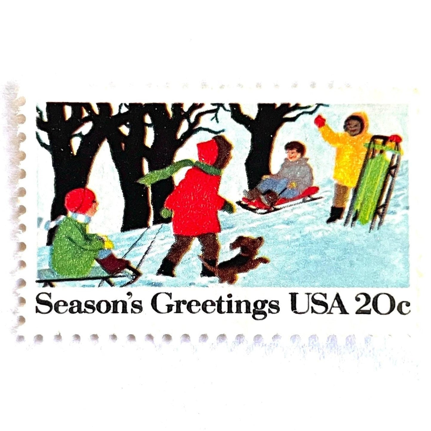 Image of 1982 Contemporary Christmas “Sledding” 20-cent stamps. Scott #2027. Stamp Themes: Christmas, Sledding, Snow, Children, Playing, Winter, Season’s Greetings. White postage stamp.
