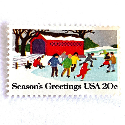 Image of 1982 Contemporary Christmas “Ice Skating” 20-cent stamps. Scott #2029. Stamp Themes: Ice Skating, Christmas, Winter Holidays, Snow, Winter Scene, Covered Bridge, Season's Greetings. Multicolored postage stamp.