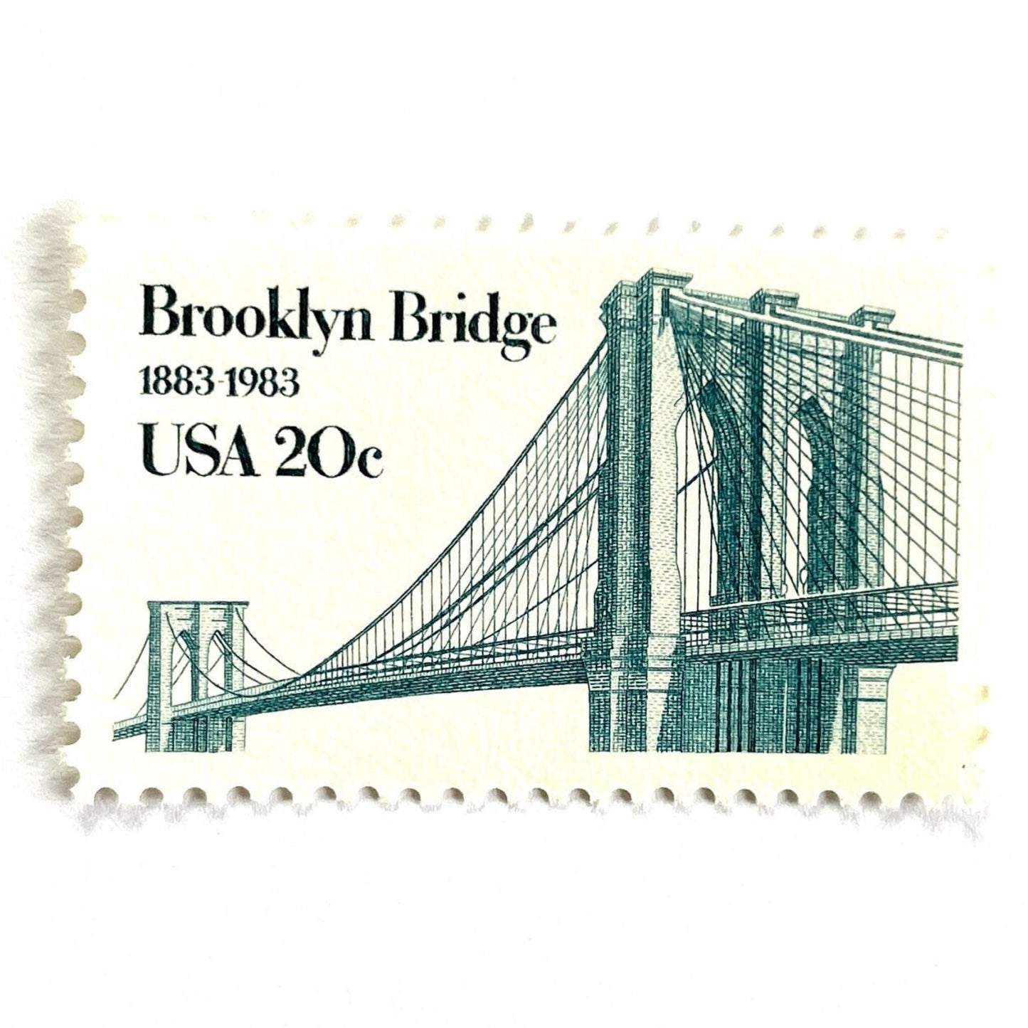 Image of 1983 “Brooklyn Bridge” 20-cent mail stamps. Scott #2041. Stamp Themes: 100th Anniversary of the Brooklyn Bridge, 8th Wonder of the World, NYC, New York City, Brooklyn. Blue postage stamp.