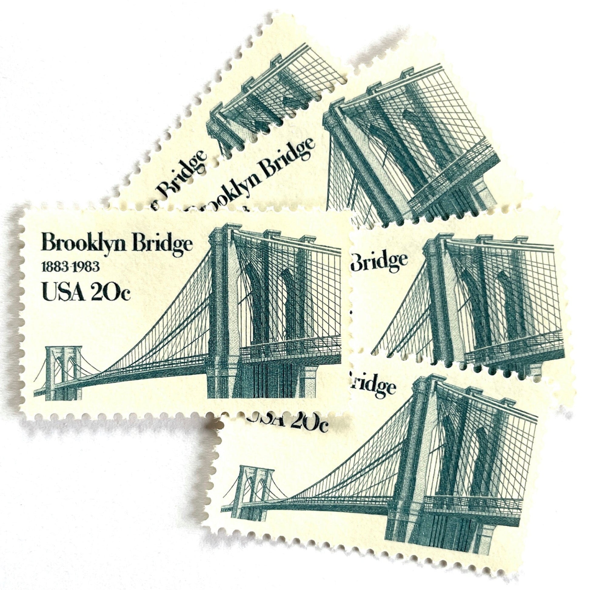 Image of 1983 “Brooklyn Bridge” 20-cent mail stamps. Scott #2041. Stamp Themes: 100th Anniversary of the Brooklyn Bridge, 8th Wonder of the World, NYC, New York City, Brooklyn. Blue postage stamp.