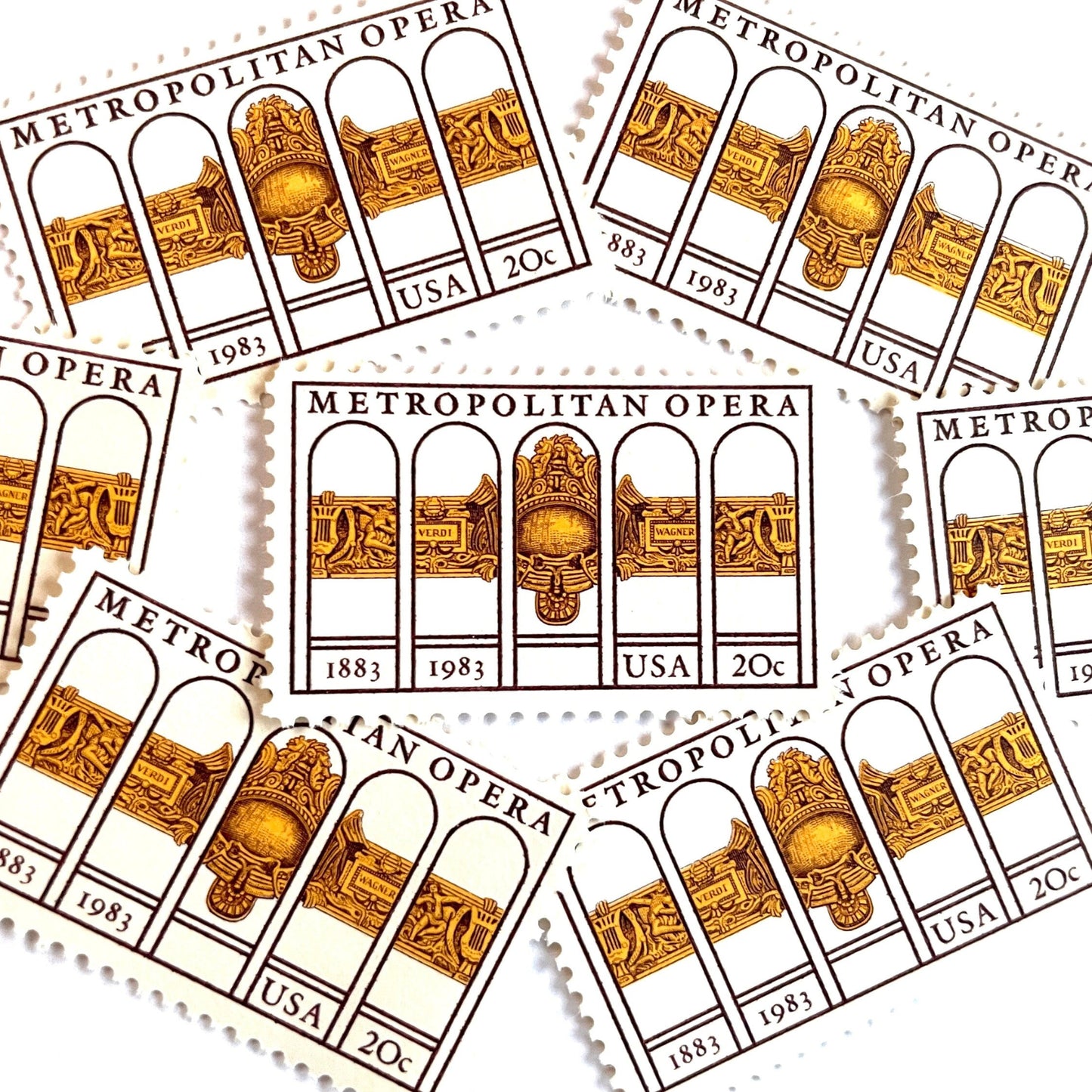 Image of 1983 “Metropolitan Opera” 20-cent mail stamps. Scott #2054. Stamp Themes: The Met, 100th Anniversary of New York's Opera, Opera House, NYC, New York City. Gold, Yellow, Maroon postage stamp.