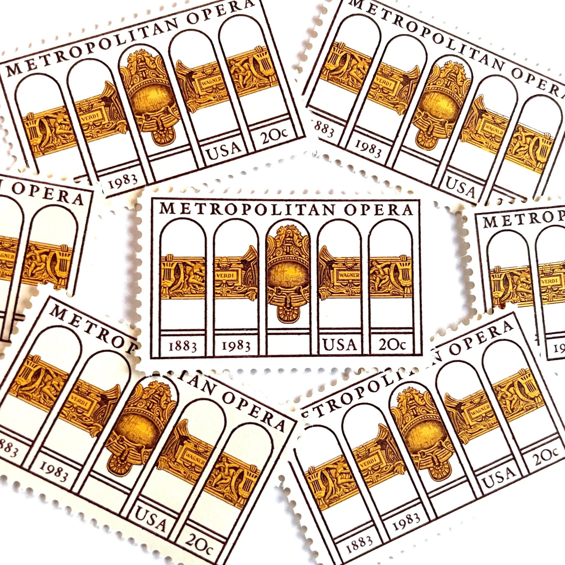 Image of 1983 “Metropolitan Opera” 20-cent mail stamps. Scott #2054. Stamp Themes: The Met, 100th Anniversary of New York's Opera, Opera House, NYC, New York City. Gold, Yellow, Maroon postage stamp.