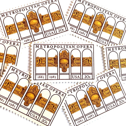 Image of 1983 “Metropolitan Opera” 20-cent mail stamps. Scott #2054. Stamp Themes: The Met, 100th Anniversary of New York's Opera, Opera House, NYC, New York City. Gold, Yellow, Maroon postage stamp.
