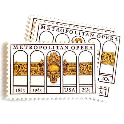 Image of 1983 “Metropolitan Opera” 20-cent mail stamps. Scott #2054. Stamp Themes: The Met, 100th Anniversary of New York's Opera, Opera House, NYC, New York City. Gold, Yellow, Maroon postage stamp.