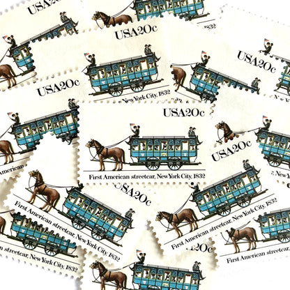 Image of 1983 Street Cars Series “First American, 1832” (John Mason Streetcar) 20-cent mail stamps. Scott #2059. Stamp Themes: First American Streetcar, NYC, New York City, Mass Transportation, Horse Drawn. Blue postage stamp.