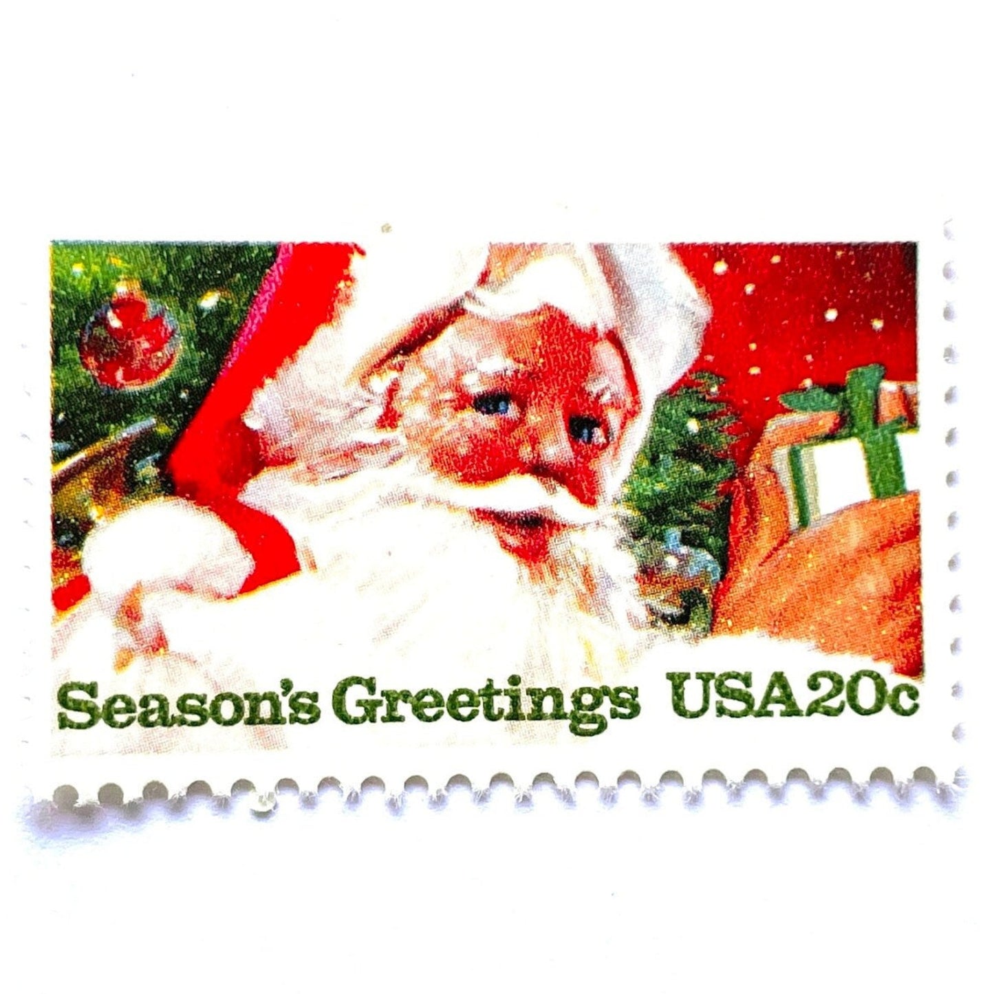 Image of 1983 Contemporary Christmas “Santa Claus” 20 cent stamps. Scott #2064. Stamp Themes: Santa Claus, Jolly St. Nick, Christmas, Holidays, Presents, Season's Greetings, Christmas Tree. Red and green postage stamp.