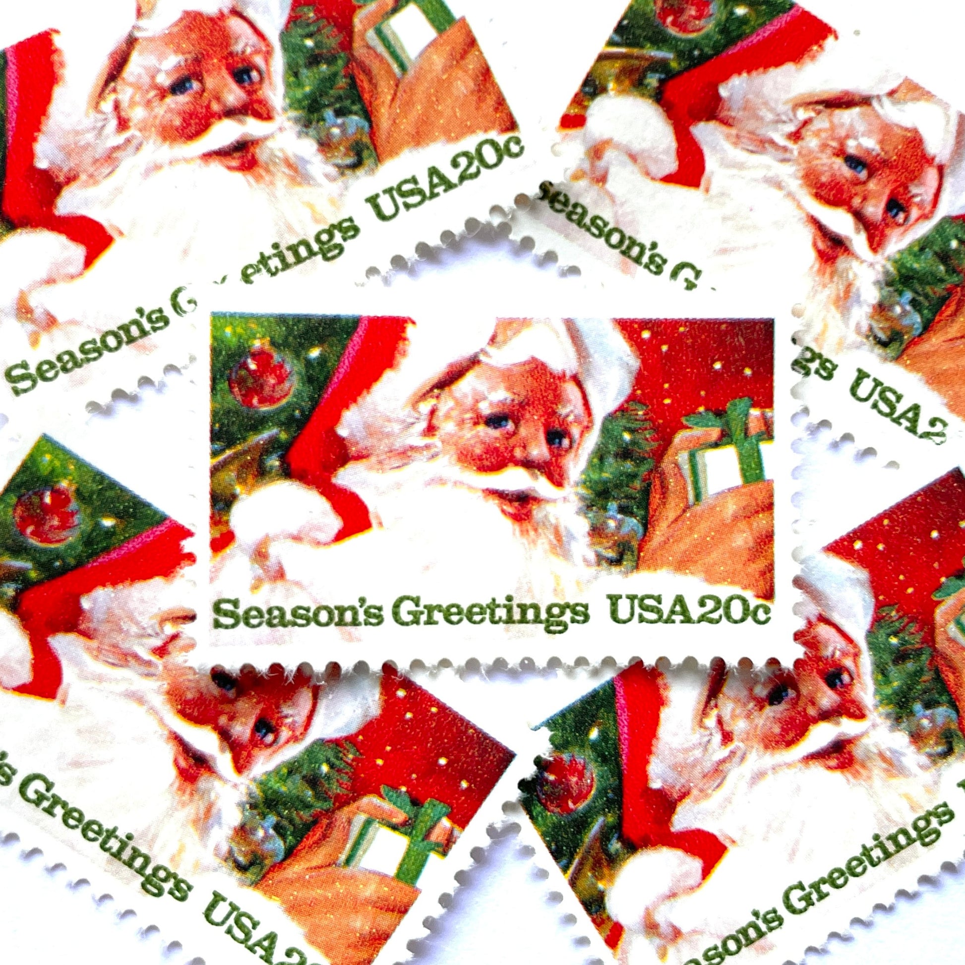 Image of 1983 Contemporary Christmas “Santa Claus” 20 cent stamps. Scott #2064. Stamp Themes: Santa Claus, Jolly St. Nick, Christmas, Holidays, Presents, Season's Greetings, Christmas Tree. Red and green postage stamp.