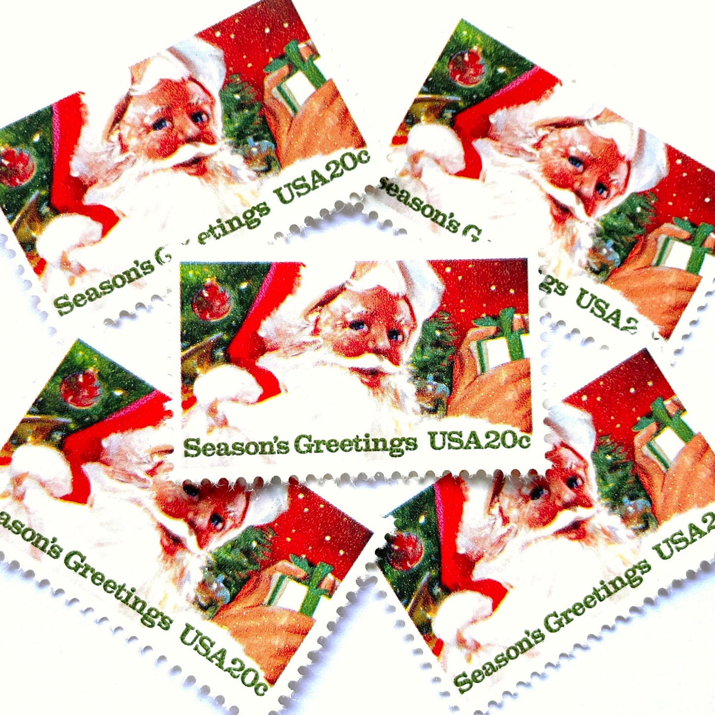 Image of 1983 Contemporary Christmas “Santa Claus” 20 cent stamps. Scott #2064. Stamp Themes: Santa Claus, Jolly St. Nick, Christmas, Holidays, Presents, Season's Greetings, Christmas Tree. Red and green postage stamp.