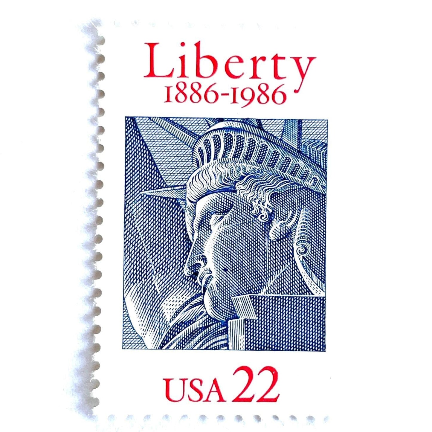 Image of 1986 “Statue of Liberty” 22-cent mail stamps. Scott #2224. Stamp Themes: Statue of Liberty, Joint Issue with France, NYC, New York City, Immigration. Red, white, and blue postage stamp.