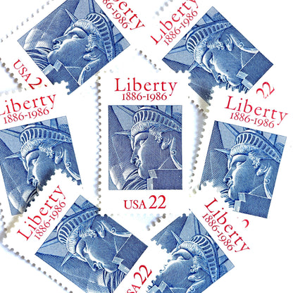 Image of 1986 “Statue of Liberty” 22-cent mail stamps. Scott #2224. Stamp Themes: Statue of Liberty, Joint Issue with France, NYC, New York City, Immigration. Red, white, and blue postage stamp.