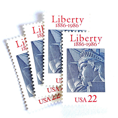 Image of 1986 “Statue of Liberty” 22-cent mail stamps. Scott #2224. Stamp Themes: Statue of Liberty, Joint Issue with France, NYC, New York City, Immigration. Red, white, and blue postage stamp.