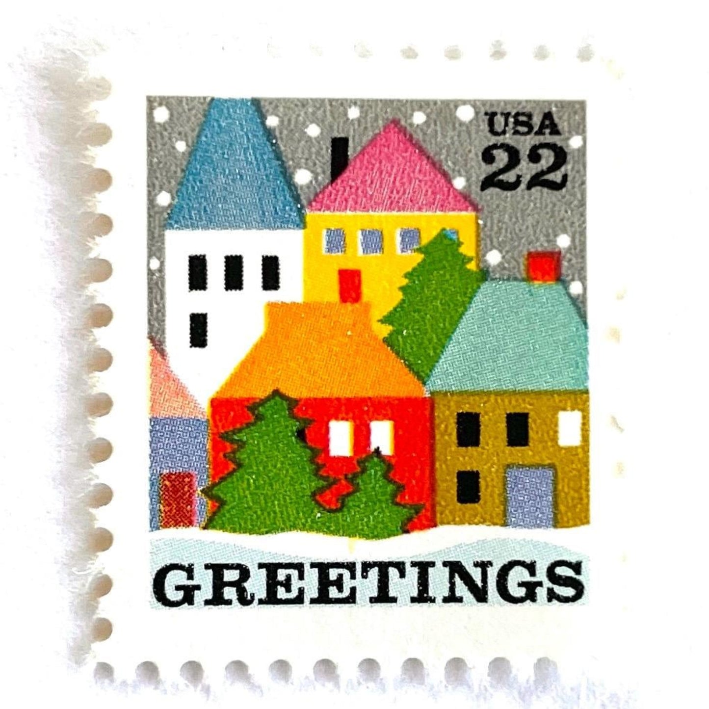 Image of 1986 Contemporary Christmas “Winter Village Scene” 22 cent stamps. Scott #2245. Stamp Themes: Christmas, Holidays, Greetings, Winter, Snow, Snowing, Houses. Multicolored postage stamp.