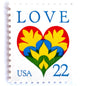 Hearts & Flowers postage stamp from 1987 featuring a colorful folk art heart surrounded by flowers on vintage unused 22-cent USPS postage, Scott 2248.