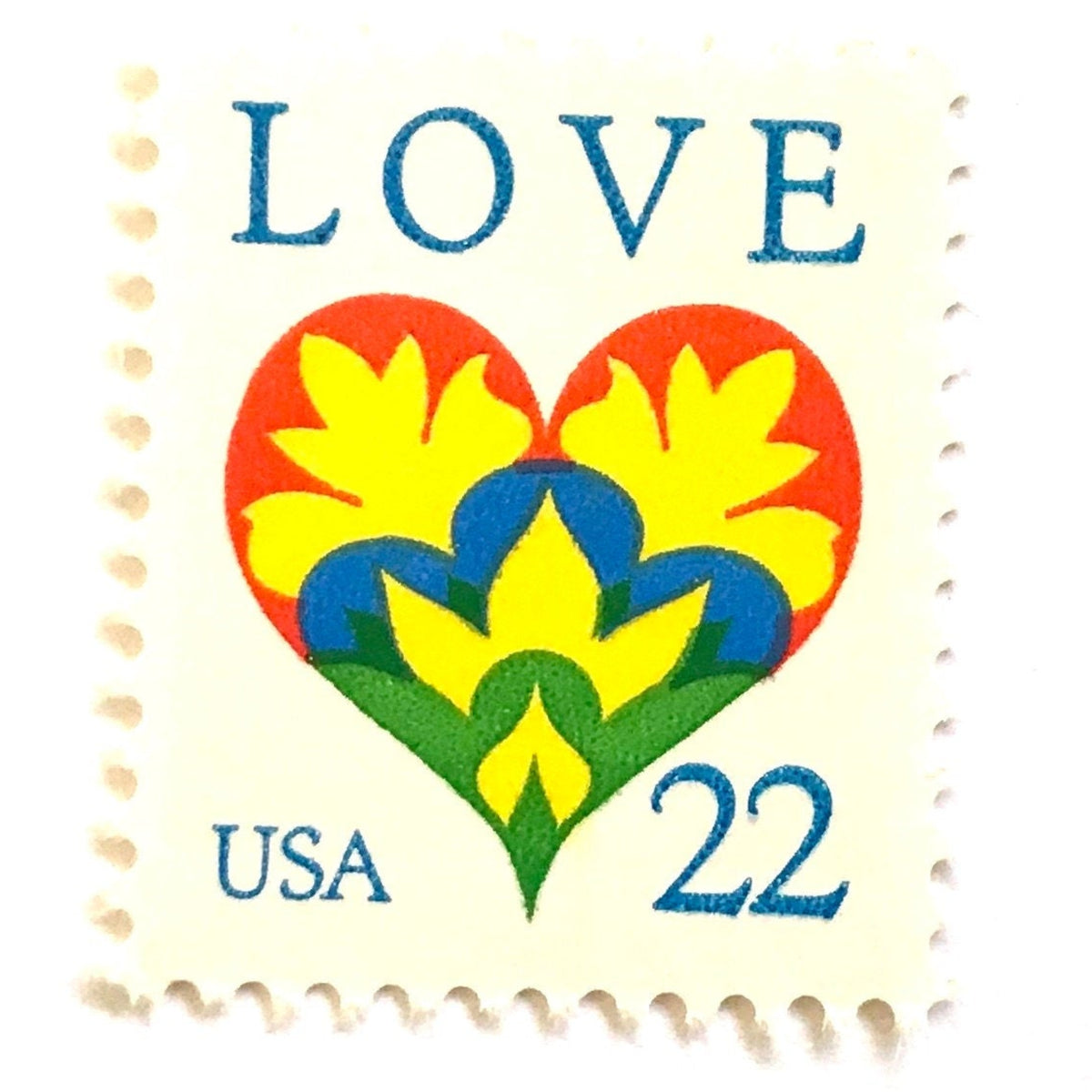 Hearts & Flowers postage stamps from 1987 featuring a colorful folk art heart surrounded by flowers on vintage unused 22-cent USPS postage, Scott 2248.