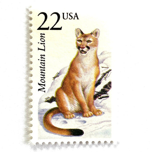 Image of 1987 North American Wildlife Series “Mountain Lion” 22-cent vintage unused USPS mail stamps. Scott #2292. Stamp Themes: Wildlife, Nature, Cougar, Feline, Cat, Big Cat, Carnivore, Hunting, Snow, Winter, Mountains, Rocky Mountains, Sierra Nevada, Appalachian Mountains, BYU Mascot - Cosmo the Cougar. Beige, Natural, Neutral, White, Multicolored postage stamps. Perfect vintage postage stamp to use for save the date announcements, wedding invitation postage, shower invitations, birth announcements, etc.