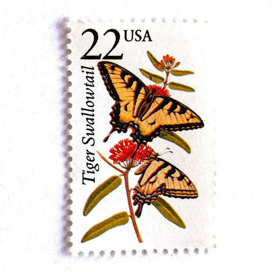 Image of 1987 North American Wildlife Series “Tiger Swallowtail Butterfly” 22-cent mail stamps. Scott #2300. Stamp Themes: Wildlife, Nature, Insect, Flying Insect, Butterfly, Pollinator, Flight, Forests, Meadows, Gardens, Wildlife Conservation. Yellow, Black, Red, Multicolored postage stamp.